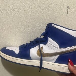 Nike Blue and Gold Jordan 1’s